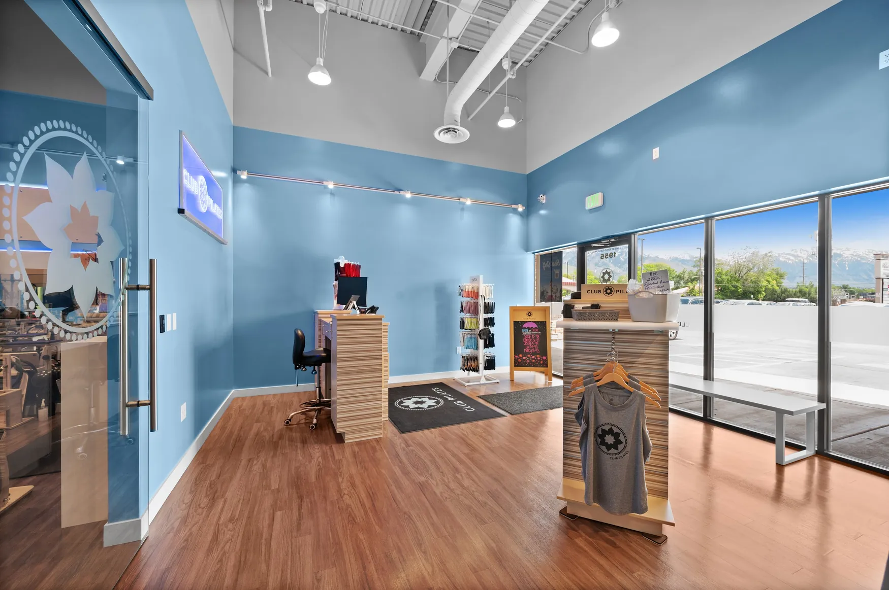 Completed commercial retail fitness studio interior with painted blue walls